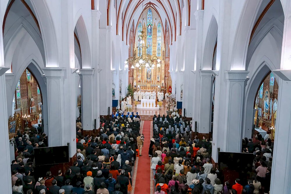 A sacred ceremony at St. Joseph’s Cathedral, where prayers and devotion fill the air